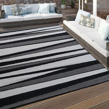 Load image into Gallery viewer, Black and Grey Reversible Striped Outdoor Rug - Capri