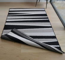 Load image into Gallery viewer, Black and Grey Reversible Striped Outdoor Rug - Capri